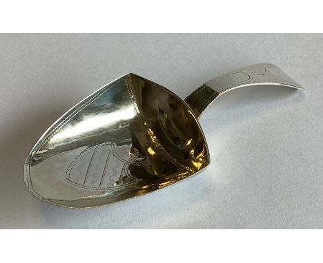 A good Georgian silver caddy scoop with bright-cut decoration. London. By TW. Approx. 7 grams.