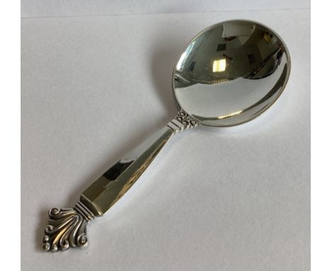 GEORG JENSEN: A good heavy silver caddy spoon of stylised form. Marked verso. Approx. 28 grams.