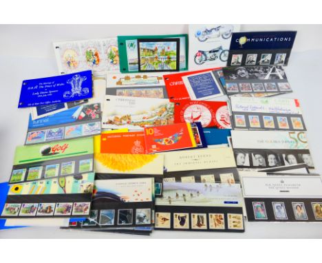 Philately - A quantity of IOM and Royal Mail mint stamp packs and a s small quantity of loose stamps. [W]