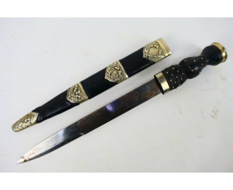 A Scottish piper's dirk with white metal queen's crown pommel, marked to the ricasso Wilkinson Sword Co Ltd London, Made In E