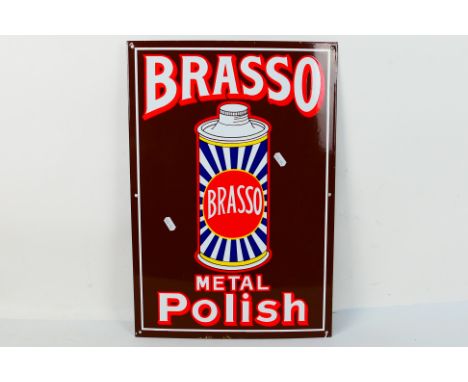 An enamel advertising sign for Brasso Metal Polish, approximately 52 cm x 35.5 cm. [W]