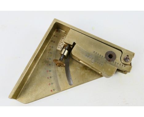 A German Third Reich Wehrmacht field artillery clinometer, bearing a Waffenamt stamp and dated 1934, makers mark for Franz Ku