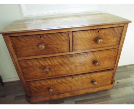 A Victorian light mahogany chest of two over two drawers measuring 88 cm x 106 cm x 42 cm. [B]
