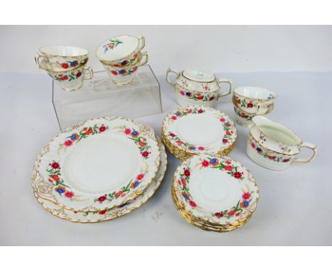 Royal Crown derby - A collection of tea wares in the Chatsworth pattern, six cups, six saucers, six side plates, milk jug, su