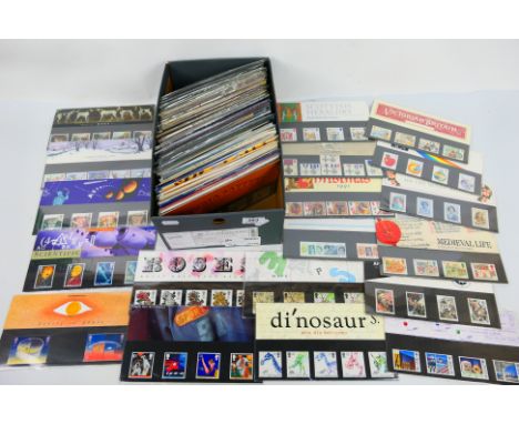 Philately - A collection of Royal mail mint stamp presentation packs, in excess of £150 face value. [W]