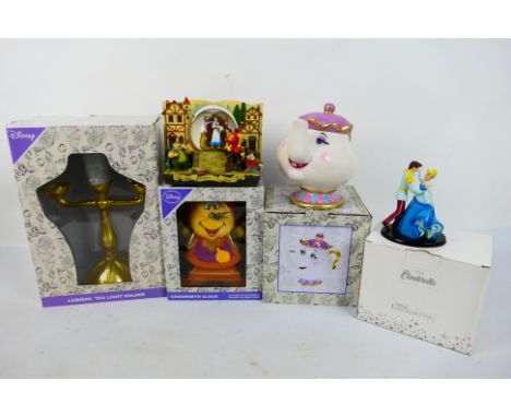 Disney - A collection of predominantly boxed Disney related items comprising Cogsworth Clock, Mrs Potts Tea Pot. Lumiere Tea 
