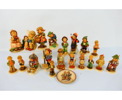 Goebel - A collection of Hummel figures to include Retreat To Safety, Little Helper, Let It Snow, Skier, Winter Adventure and
