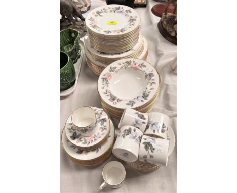 A Royal Worcester 'June Garland' part dinner service, various plates, bowls etc. approximately 60 pieces. A Royal Worcester "