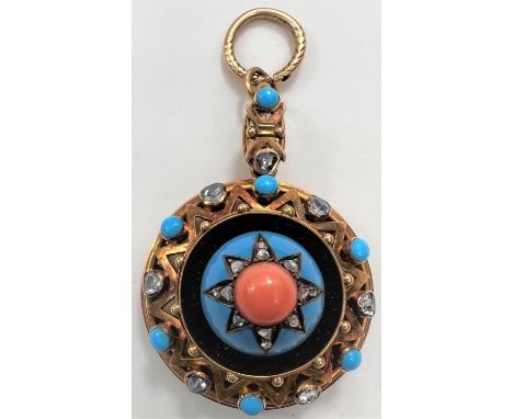 A Victorian style pendant, the top loop stamped 18 and pendant tests as 18ct, it is raised setting with central cabochon cora