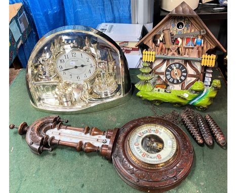 A cuckoo clock; a modern gilt mantel clock; a 1930's barometer 
