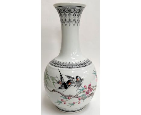 A 20th Century Chinese Republic style vase decorated with birds on trees, seal mark to base 