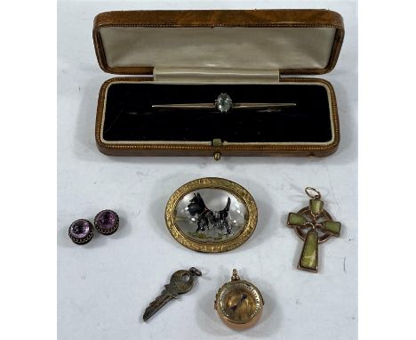 A 9ct hallmarked gold, stone set, Celtic cross; a bar brooch with blue stones, stamped 9ct, 8.3gms &amp; other costume jewell