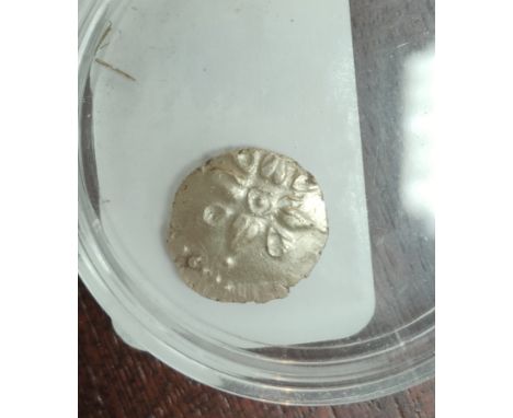 A Celtic Quarter-Stater with horse to one side and flower with various petals&nbsp; 
