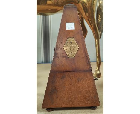 A wooden cased metronome&nbsp; 