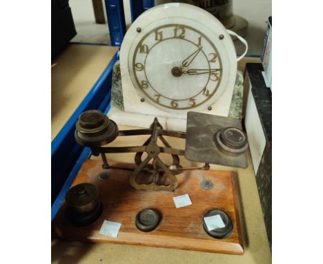 An Art Deco table lamp in white/green marble; a set of postage scales 