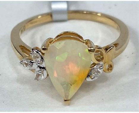 A 9 carat hallmarked gold dress ring, set with a pear shaped Ethiopian cut opal 10 x 7mm, 1.12 carat.&nbsp; Size N