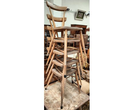 A set of five Ercol light elm stacking dining chairs with bar backs (some woodworm in need of a polish etc) Height top of sea