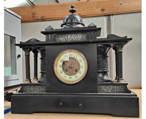 A 19th century mantel clock in architectural black marble case with domed top and Corinthian side pillars, 8 day French strik
