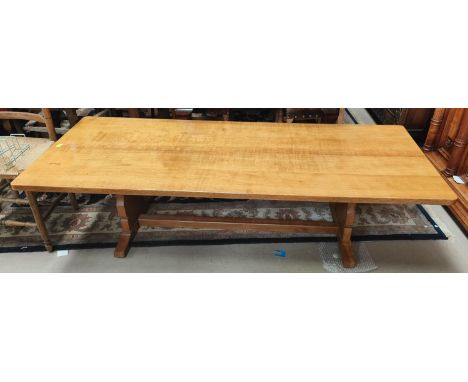 ROBERT THOMPSON MOUSEMAN of KILBURN; An unusually large refectory style low coffee table with adzed 4 plank top over solid en