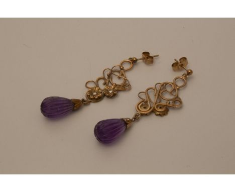 A pair of amethyst earrings stone set 