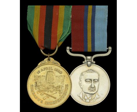 Pair: P. A. Low, Rhodesian and Zimbabwean Forces, who was later killed during a toll booth heist, whilst working as a securit