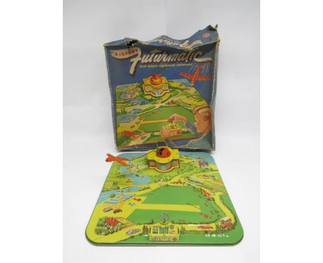 A boxed Marx clockwork tinplate Futurmatic Airport with remote controlled aeroplane, with key, box poor