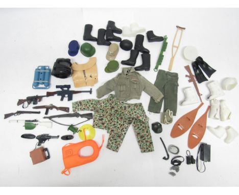 A collection of vintage Action Man and similar weapons, accessories and clothing