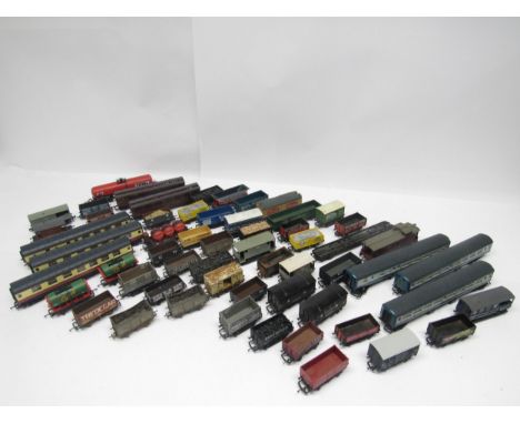A collection of loose and playworn 00 gauge model railway passenger coaches and goods wagons including Hornby, Triang, Lima, 