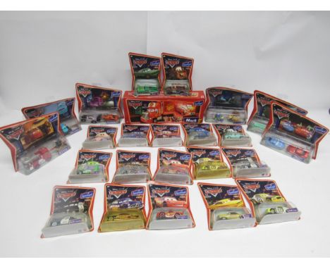 Twenty-three carded Mattel Disney Pixar Cars diecast vehicles and one boxed example (23)