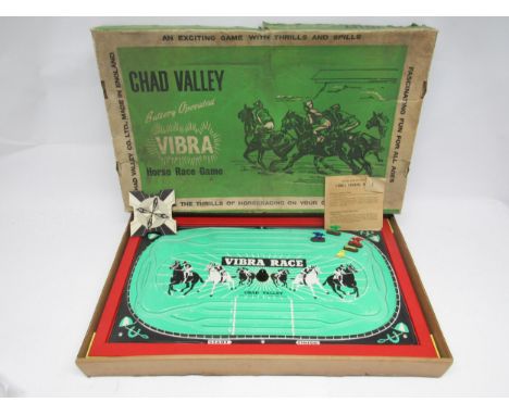 A 1960s Chad Valley 'Vibra' horse racing game (one counter snapped), boxed with instructions