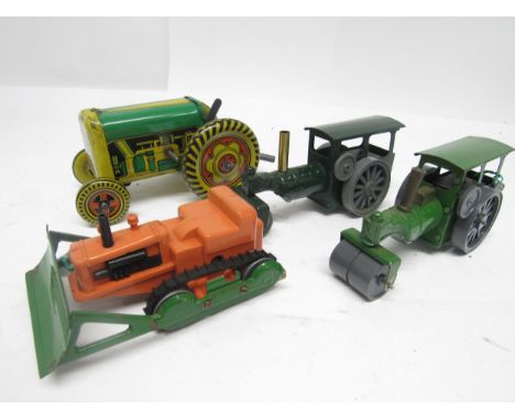 Three playworn Triang Minic clockwork vehicles to include two green tinplate steam rollers (one with replaced chimney) and or