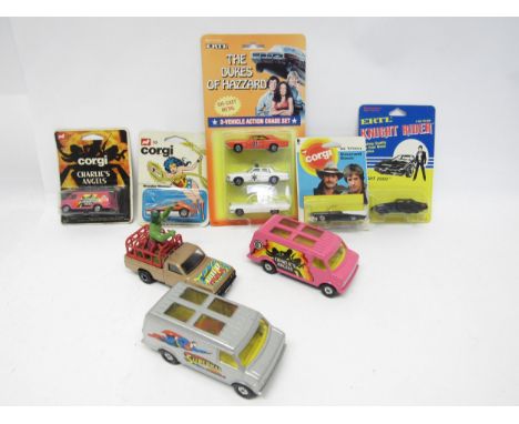 Three carded Corgi Juniors TV related diecast model vehicles to include 33 Wonder Woman, 21 Charlie's Angels Van and 152 Simo