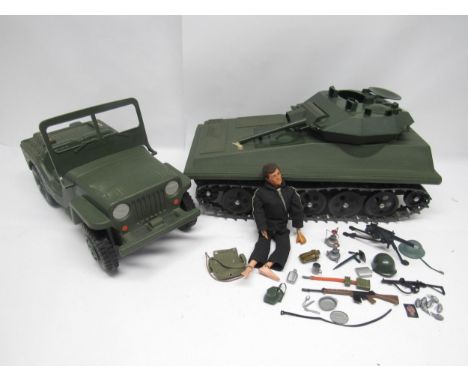A vintage playworn Palitoy/Hasbro Action Man figure with brown flock hair and Eagles Eyes, together with a tank, Jeep and ass