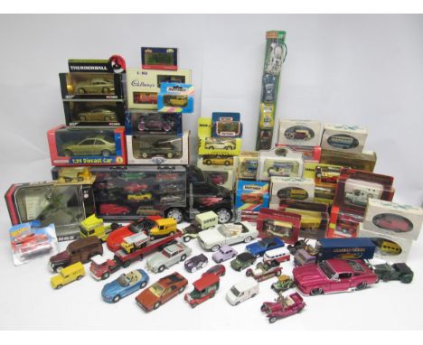 A collection of boxed and loose diecast and plastic model vehicles including Corgi James Bond 007 Directors Cut, Motor Max Sk