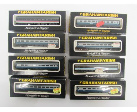 A collection of boxed Graham Farish N gauge model railway rolling stock, comprising Mk II Inter-City blue/grey passenger coac