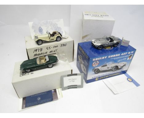 Three Franklin Mint 1:24 scale diecast cars to include 1961 Jaguar E Type, 1938 Jaguar SS-100 and Shelby 427 S/C (3, all with