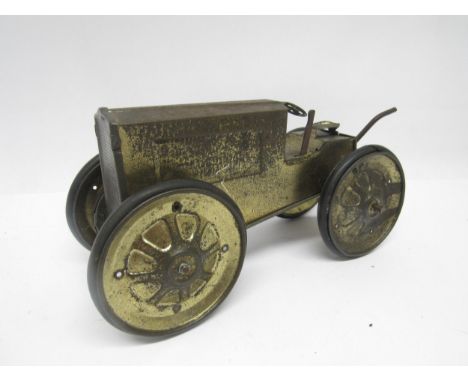 A playworn early 20th Century Animate Toys (USA) clockwork tinplate tractor, 22cm long