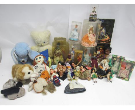 A collection of boxed and loose tourist and costume dolls including Lenci, together with a smaller number of teddy bears and 