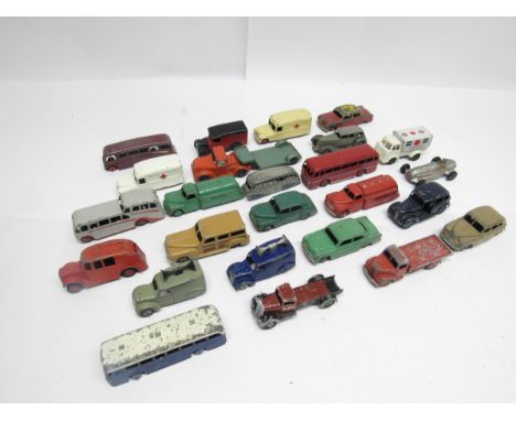 A collection of 1940's and earlier playworn Dinky Toys diecast vehicles, a Benbros low loader and a Wells Brimtoy tinplate an