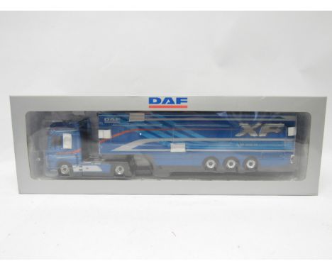 A boxed WSI Models 1:50 scale diecast heavy haulage model 02-2079 DAF XF Super Space Cab and Box Trailer