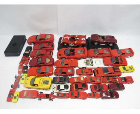 A collection of loose 1:18 scale and smaller diecast model Ferrari sports cars including Burago, Revell, Corgi, Maisto, Match