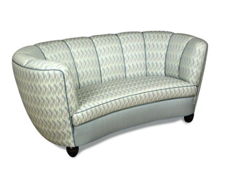 Slagelse Møbelværk, a Danish Art Deco 'Banana' sofa, the shaped upholstered sofa raised on beech block feet 71 x 160 x 85cm (