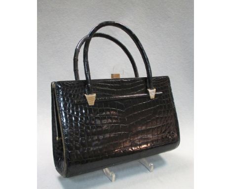 Christian Dior, a vintage black patent 'crocodile' leather handbag, with gilt snap closure, stamped inside 18 x 26cm (7 x 10i