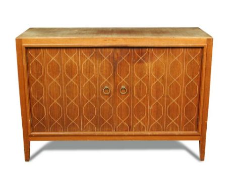 A Gordon Russell teak Helix sideboard, designed by Booth & Ledeboer, labelled 'Russell of Broadway', with shelf and drawer in