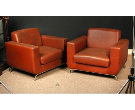 A pair of cognac leather club chairs, circa 1980, 74 x 91 x 73cm (29 x 35 x 28in)  