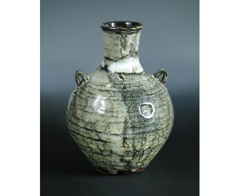 § Trevor Corser, (born 1938), A Leach Pottery stoneware vase, with dolomite glaze, impressed seal marks 29cm (11in)  