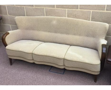 A 1950's Danish three seat sofa, upholstered in cream moquette 80 x 179 x 74cm (31 x 70 x 29in)  