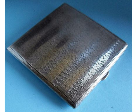 A George V silver cigarette case with engine turned decoration, inscribed to inside, by D Bros, Birmingham, 1929, 4.6 oz 