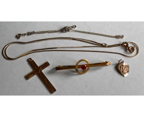 A 9ct gold bar brooch with ruby coloured stone, a 9ct crucifix, two 9ct gold neck chains and a St. Christopher pendant (5). G