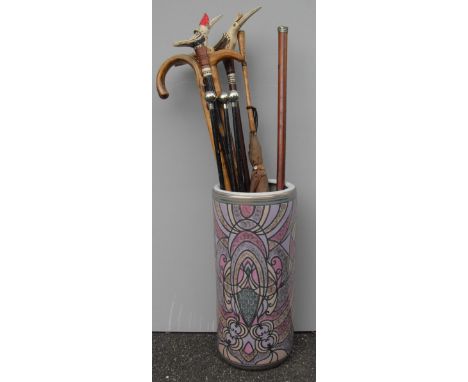 A cylindrical ceramic multi-coloured stick or umbrella stand, 46 cm H 